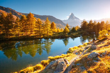 Awesome view of Matterhorn spire. Location Grindjisee lake, Swiss alp, Switzerland, Europe.