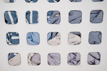 clothes in a washing basket in a laundry