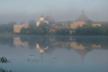 View of the Old Ladoga fortress in the morning June mist. Staraya Ladoga. Leningrad region, Russia
