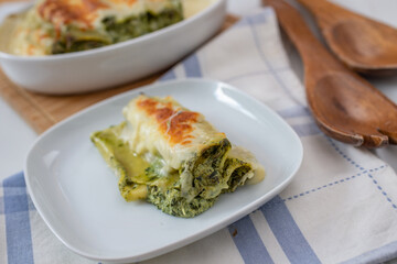 Cannelloni with ricotta and spinach. Italian cuisine. 