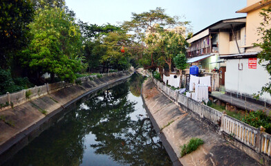 Fototapeta na wymiar Chiang Mai, Thailand - Canal & Homes