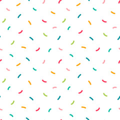 Colorful confetti sprinkles vector seamless pattern background for party design.