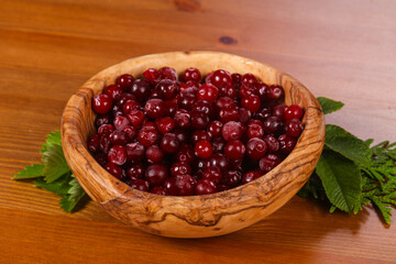 Cranberry in the wooden bowl