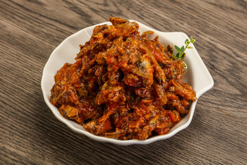 Canned anchovy in tomato sauce