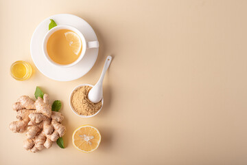 hot ginger tea with honey lemon and mint on a light background