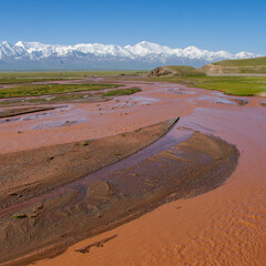 View of Lenin Peak nowadays Ibn Sina peak in the snow-capped Trans-Alai mountain range in southern...