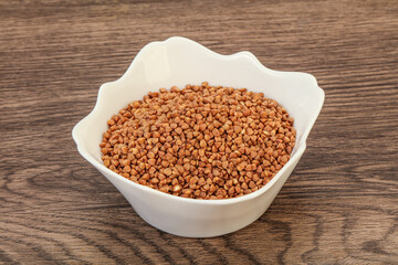 Raw buсkwheat cereal in the bowl