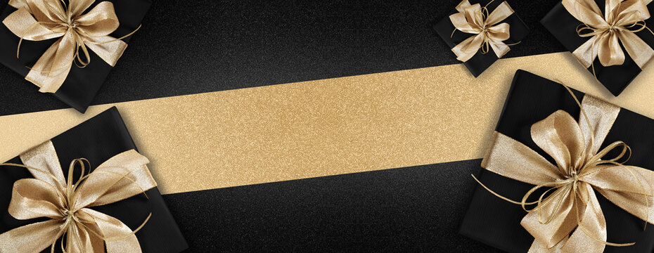 Black Friday gift package wrapped with golden ribbon bow isolated on black background, template for promotional card with copy space
