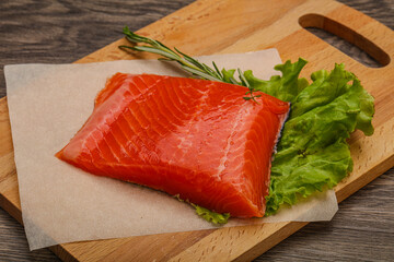 Salmon piece steak served rosemary