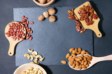 Healthy mix of nuts. Pecans, Cashews, almonds, peanuts, walnuts. copy space