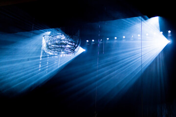 light in the dark smoke. Background of empty stage show. Abstract dark background.