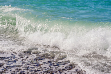 sea waves on the beach. Selective focus. Summer nature background.