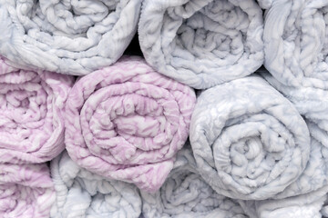 Fototapeta na wymiar Fleece close-up warm, soft blanket. A crumpled soft blanket. texture background