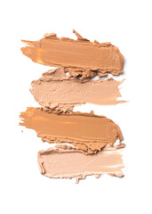 Close-up of make-up swatches. Smears of beige skincare beauty product concealer or foundation