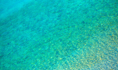 Fototapeta na wymiar Water surface background - Beautiful calm sea with clean turquoise water,nature ocean background