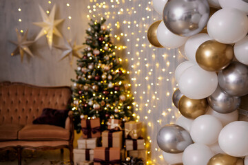 festive christmas decor with golden and silver balloons