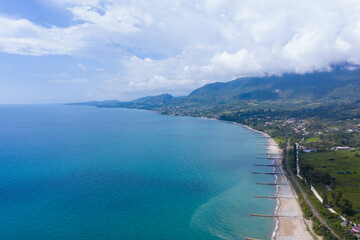 The Black Sea coast from the height of the flight. Aerovideo. New Athos, Abkhazia, Georgia.