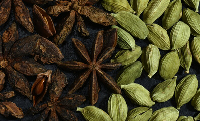 Star Anise (Chakra Phul)  and Cardamom closeup photos.Indian spices.