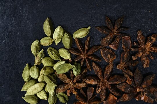 Star Anise (Chakra Phul)  and Cardamom closeup photos.Indian spices.