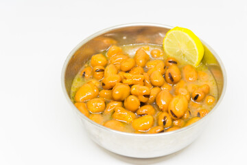 Egyptian Traditional Breakfast Dish of Beans isolated on white background