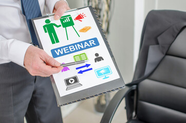 Webinar concept on a clipboard