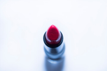 red lipstick on a white background