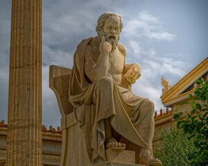 Socrates the ancient Greek philosopher sitting in deep thoughts staue, Athens Greece