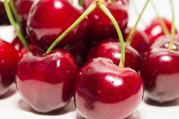 close up ripe cherries on a white background