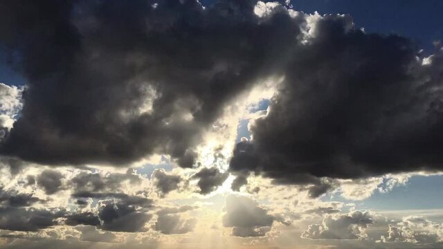 time lapse of clouds and sun