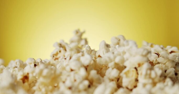 delicious popcorn on a rotating background