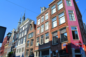 Traditional dutch architecture, facades of houses in Amsterdam, The Netherlands.