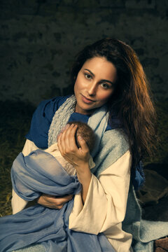 Holy Mother And Baby With Christmas