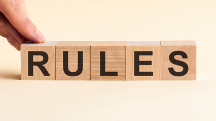 Woman made word RULES with wood blocks