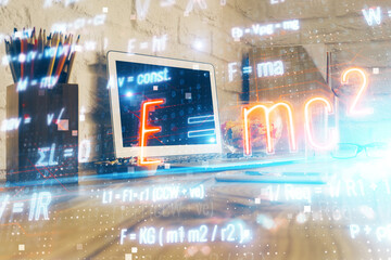 Desktop computer background and formula hologram writing. Double exposure. Education concept.