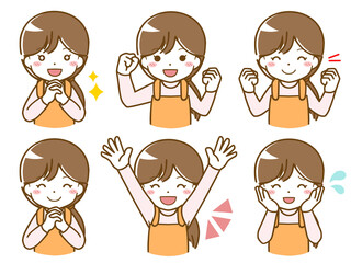 エプロンを着た女性の楽しい表情