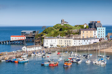 Fototapeta na wymiar Tenby Harbour Pembrokeshire Wales which is a popular seaside resort town and a popular travel destination tourist attraction landmark, stock photo image