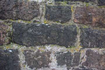 Castle wall made of old stones textures for design and photo background.