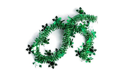 Green tinsel on white background. High quality photo