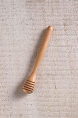 honey dipper on a white background