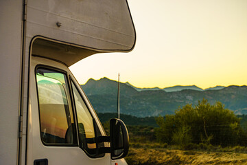 Rv camper camping on nature, Spain. - obrazy, fototapety, plakaty