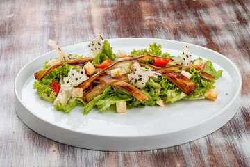 Salad with baked eggplant, mozzarella and romaine lettuce