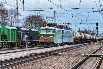 Fototapeta na wymiar Freight train moves on the station. Trans Siberian railway.