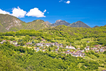 Fototapeta na wymiar Idyllic village in Dolomites Alps above Garda lake view