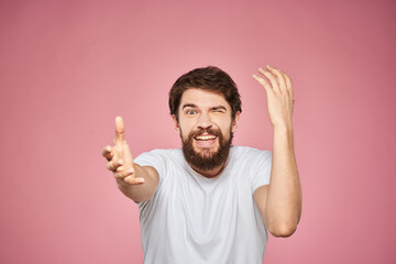 cheerful bearded man white t-shirt emotions cropped view pink background