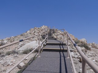 Concrete stairs with railings leading to the view deck at the rim of Meteor Crater, formerly known...