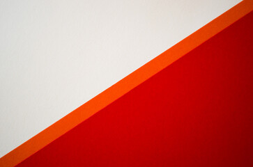 Diagonally divided with orange line red and white background