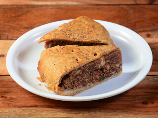 Dil pasand slices, Indian Tea Time Breakfast which contains sweet bread made from coconut gratings, sugar and nuts.