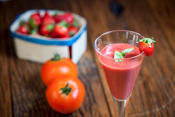 gazpacho with strawberry and tomato presented in a cocktail glass