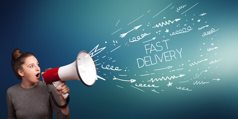 Young girl screaming to megaphone with FAST DELIVERY inscription, shopping concept