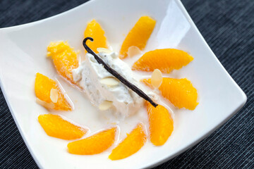 Orange wedges with vanilla yoghurt